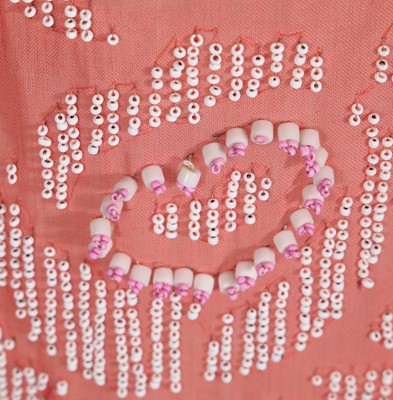 Lot 368 - A beaded pink muslin flapper dress, circa 1925