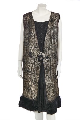 Lot 371 - A black and silver lamé flapper dress, circa 1925