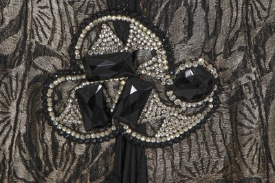 Lot 371 - A black and silver lamé flapper dress, circa 1925