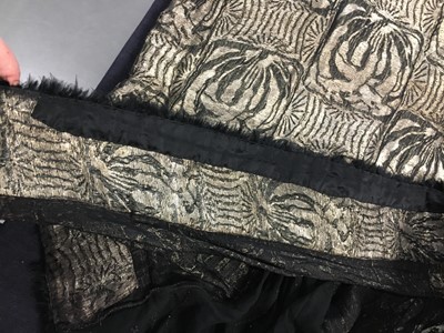 Lot 371 - A black and silver lamé flapper dress, circa 1925