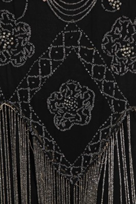Lot 372 - A beaded black chiffon flapper dress, circa 1925