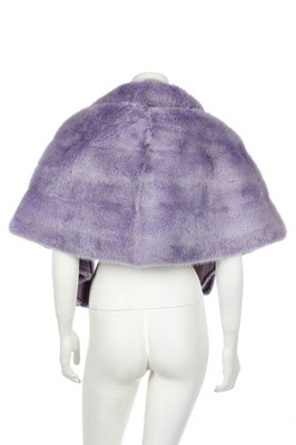 Lot 252 - A black and white monkey fur capelet, colobus...