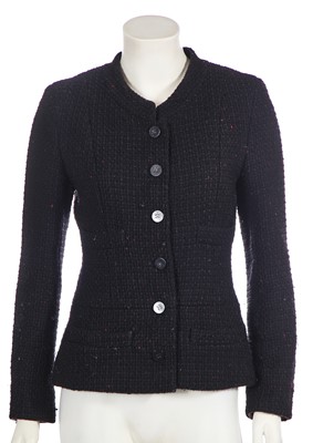 Lot 16 - A Chanel black bouclé jacket, 1990s