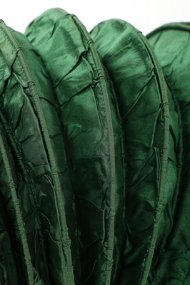 Lot 488 - A green silk caleche bonnet, early 19th...