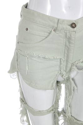Lot 154 - A pair of Martin Margiela shredded jeans, 2002