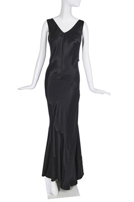Lot 233 - A John Galliano black bias cut evening gown, circa 1995