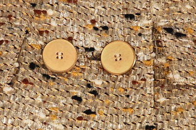 Lot 420 - A Madeleine de Rauch gold tweed cocktail suit, circa 1968