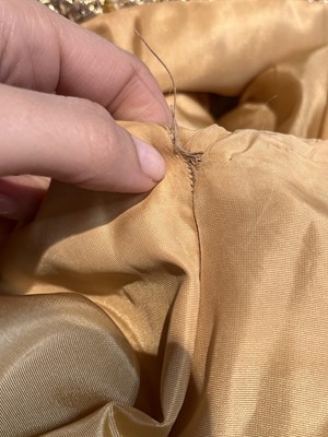 Lot 420 - A Madeleine de Rauch gold tweed cocktail suit, circa 1968