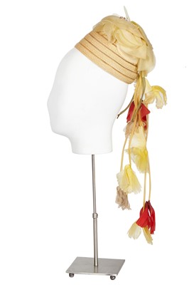 Lot 423 - A Christian Dior trailing blossom hat, 1960s