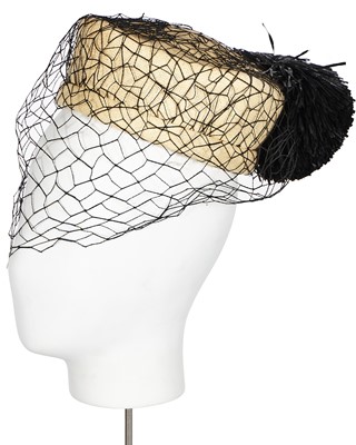 Lot 424 - A Christian Dior straw pillbox hat, circa 1960