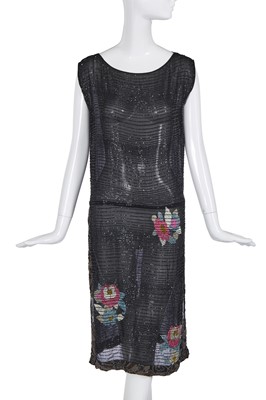 Lot 487 - A floral beaded flapper dress, mid 1920s