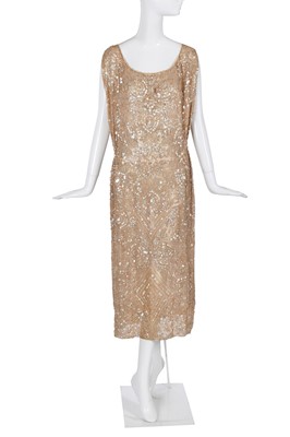 Lot 488 - A pearlescent beaded ecru chiffon flapper dress, circa 1922