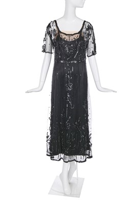 Lot 489 - A sequined black tulle overdress, 1912-14