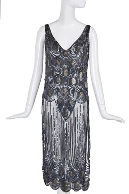 Lot 490 - A sequined black tulle flapper dress/tunic, circa 1925