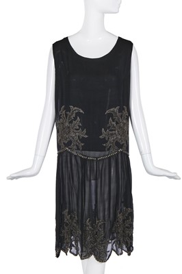 Lot 492 - A beaded black chiffon flapper dress, circa 1926