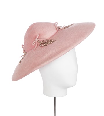 Lot 457 - A Christian Dior New York pink felt hat, 1950s