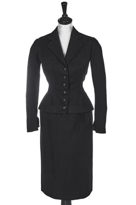 Lot 459 - A Christian Dior haute couture black wool day suit, probably Autumn-Winter 1949