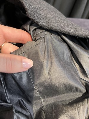 Lot 460 - A Pierre Balmain haute couture charcoal grey wool suit, circa 1949