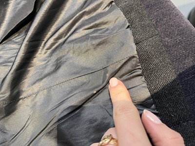 Lot 460 - A Pierre Balmain haute couture charcoal grey wool suit, circa 1949