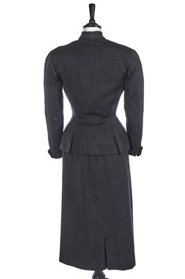 Lot 460 - A Pierre Balmain haute couture charcoal grey wool suit, circa 1949