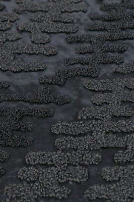 Lot 182 - A Paquin black satin coat, 1919, large woven...