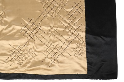 Lot 182 - A Paquin black satin coat, 1919, large woven...