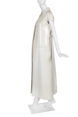 Lot 429 - A Courrèges haute couture ivory vinyl maxi ensemble, late 1960