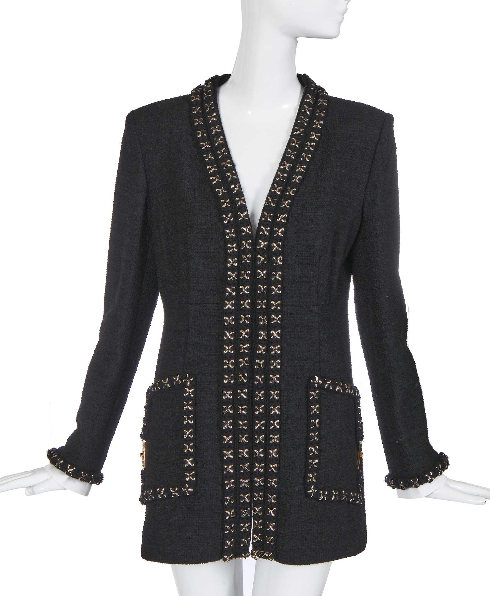 Click for high resolution Lot 27 - A fine Chanel black bouclé wool jacket, possibly 'Paris-Cosmopolite' collection, Métiers d'Art, Pre-Fall 2017