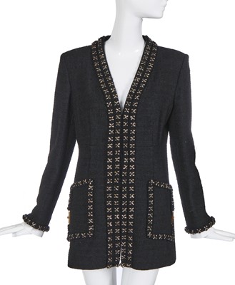 Lot 27 - A fine Chanel black bouclé wool jacket, possibly 'Paris-Cosmopolite' collection, Métiers d'Art, Pre-Fall 2017