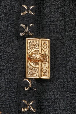 Lot 27 - A fine Chanel black bouclé wool jacket, possibly 'Paris-Cosmopolite' collection, Métiers d'Art, Pre-Fall 2017