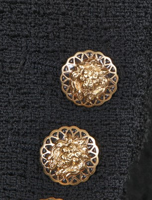 Lot 27 - A fine Chanel black bouclé wool jacket, possibly 'Paris-Cosmopolite' collection, Métiers d'Art, Pre-Fall 2017