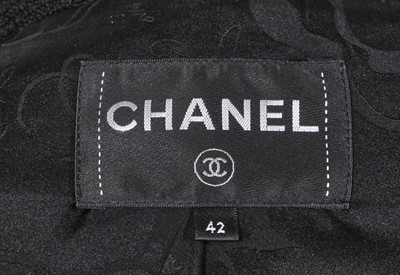 Lot 27 - A fine Chanel black bouclé wool jacket, possibly 'Paris-Cosmopolite' collection, Métiers d'Art, Pre-Fall 2017