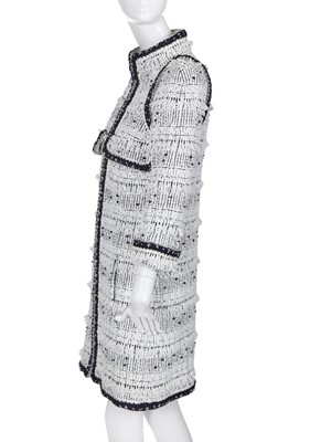 Lot 34 - A Chanel white and black tweed coat, Autumn-Winter 2017-18