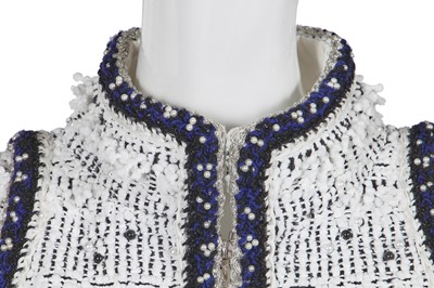 Lot 34 - A Chanel white and black tweed coat, Autumn-Winter 2017-18