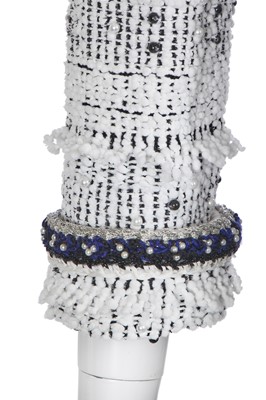 Lot 34 - A Chanel white and black tweed coat, Autumn-Winter 2017-18