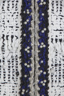 Lot 34 - A Chanel white and black tweed coat, Autumn-Winter 2017-18