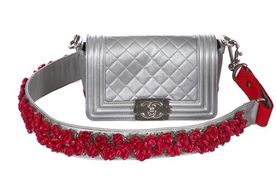 Lot 43 - A Chanel small silver Boy bag with flower strap,  'Paris-Bombay' collection, Métiers d'Art, Pre-Fall 2012