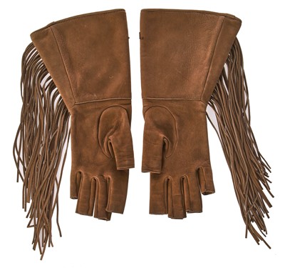 Lot 46 - A pair of Chanel fringed suede gloves, 'Paris-Dallas' collection, Métiers d'Art, Pre-Fall 2014