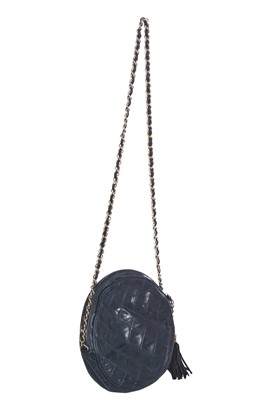 Lot 49 - A Chanel navy quilted leather circular bag, late 1980s