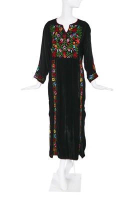 Lot 409 - A Thea Porter embroidered black velvet maxi dress, circa 1970