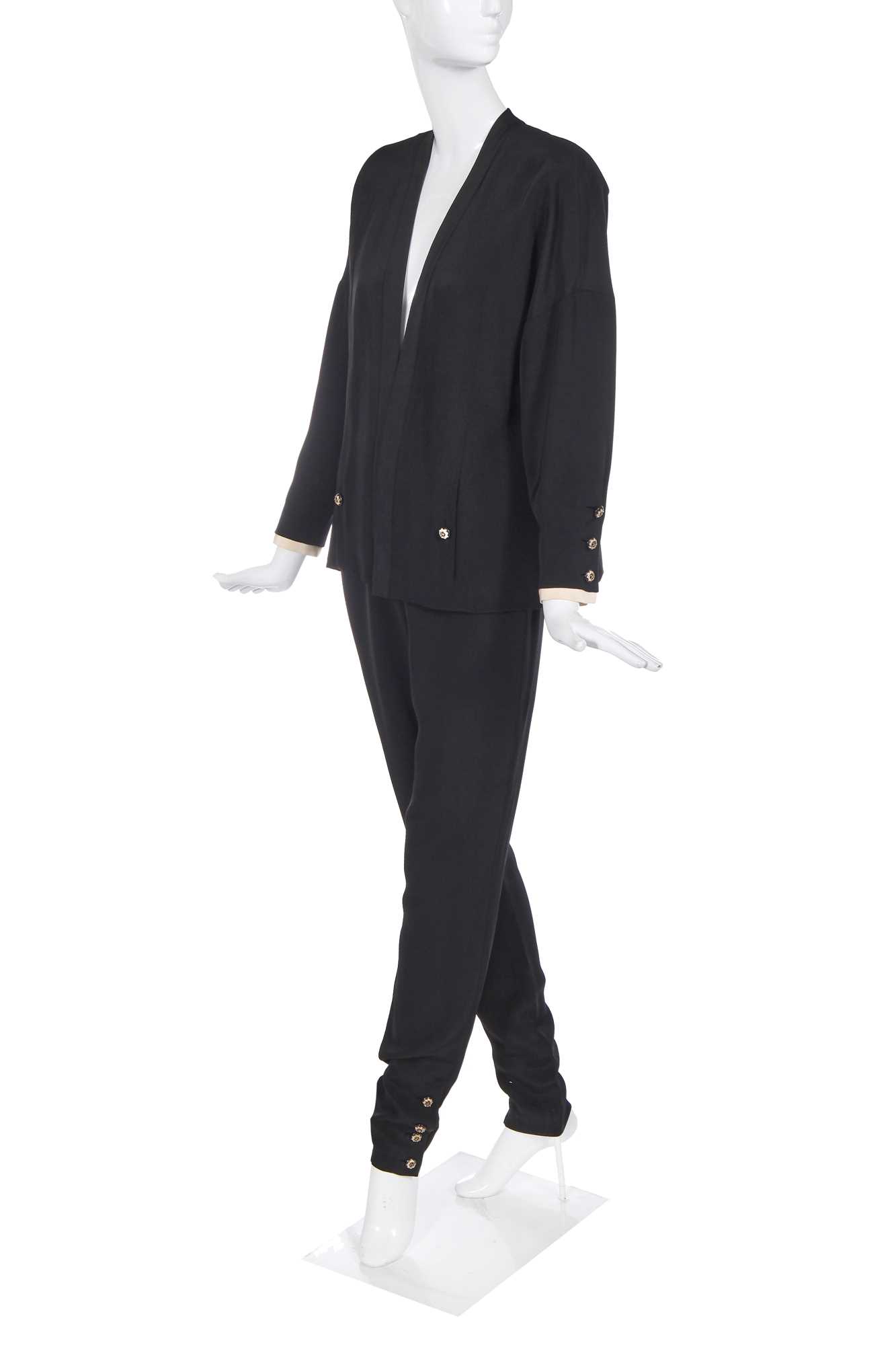 Lot 54 - A Chanel Haute Couture by Karl Lagerfeld black silk crêpe suit, Autumn Winter 1986-87