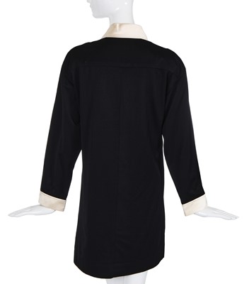 Lot 55 - A Chanel black silk and ivory satin dress, late 1980s