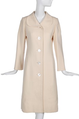 Lot 57 - A Chanel haute couture by Yvonne Dudel and Jean Cazaubon ivory wool coat, 1979