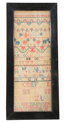 Lot 504 - Two embroidered band samplers, the first by...