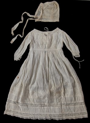 Lot 498 - A white cotton baby dress and bonnet, worn by Princess Elizabeth