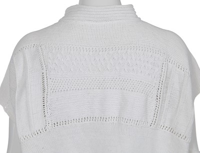 Lot 334 - A John Galliano white knitted wool jumper, 'Fallen Angels' collection, Spring-Summer 1986
