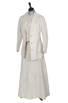 Lot 490 - A rare Redfern ivory linen summer sporting suit, circa 1905