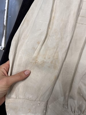 Lot 503 - A rare Redfern ivory linen summer sporting suit, circa 1905