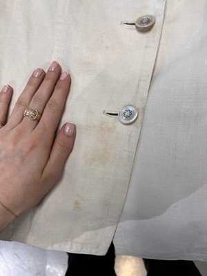 Lot 503 - A rare Redfern ivory linen summer sporting suit, circa 1905