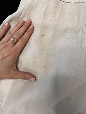 Lot 503 - A rare Redfern ivory linen summer sporting suit, circa 1905